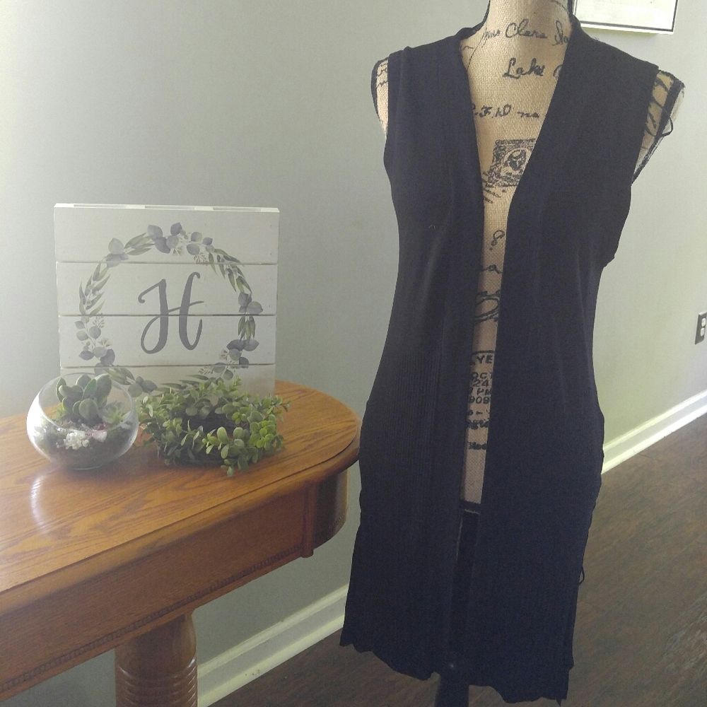 Black knit vest with lace up sides